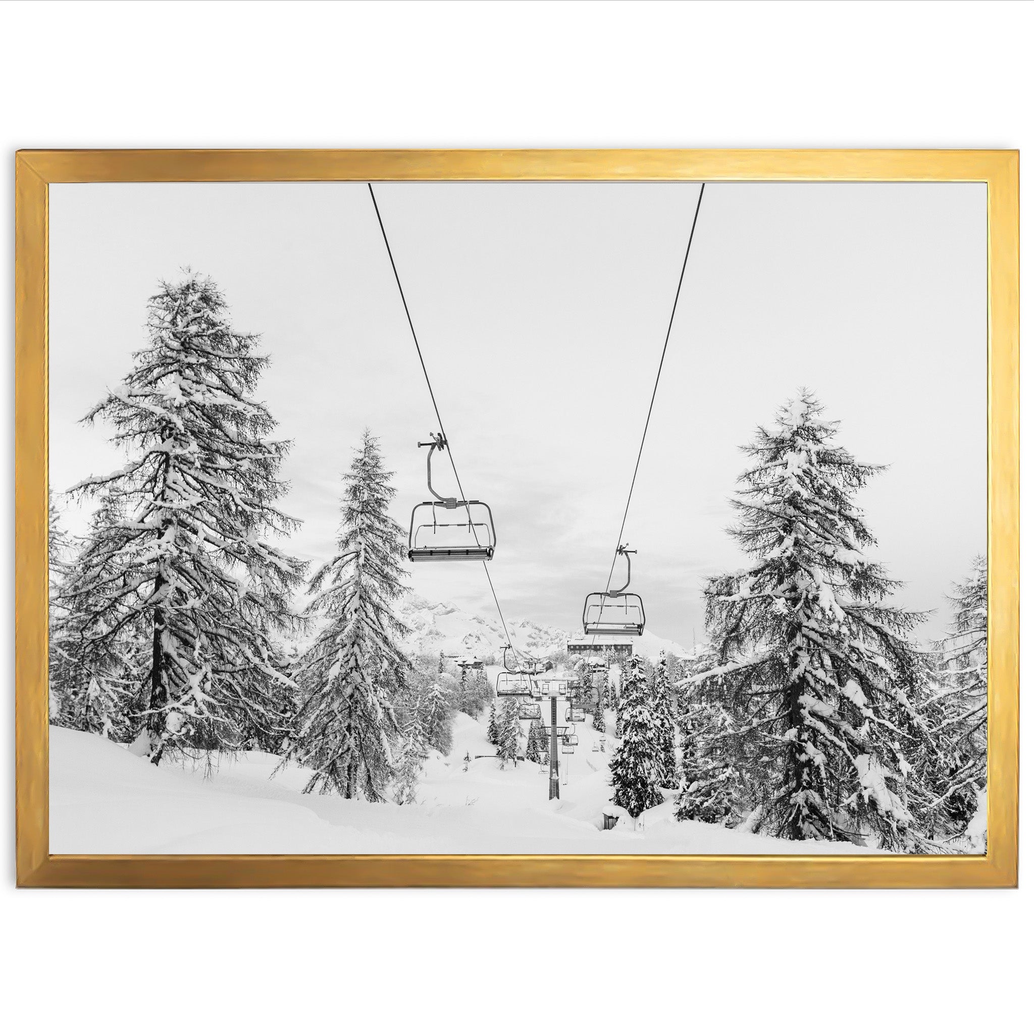 a black and white photo of a ski lift