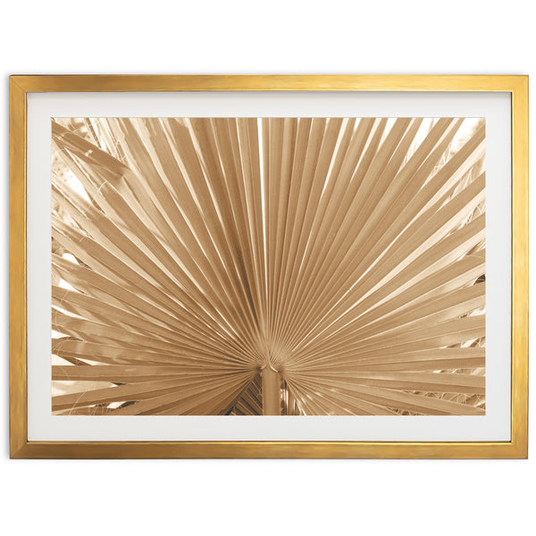 a picture of a palm leaf in a gold frame