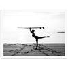 a man holding a surfboard over his head on a beach