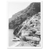 a black and white photo of a beach with houses on it