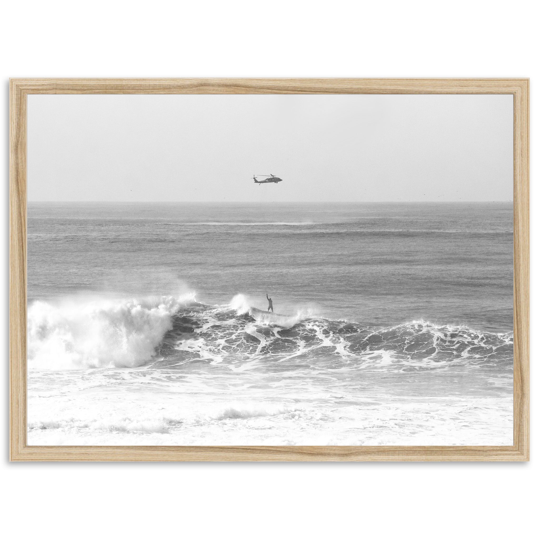 a black and white photo of a boat in the ocean