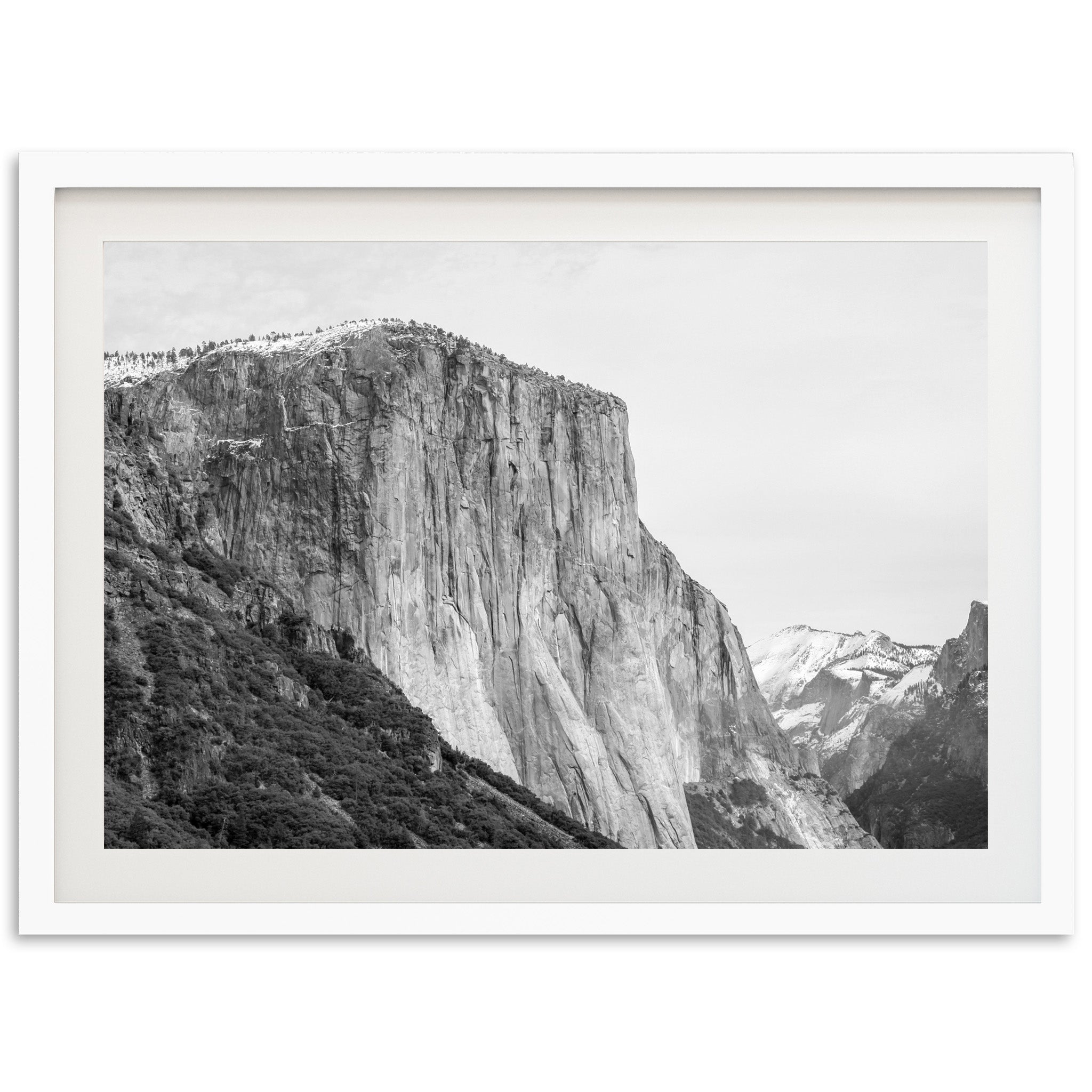 a black and white photo of a mountain