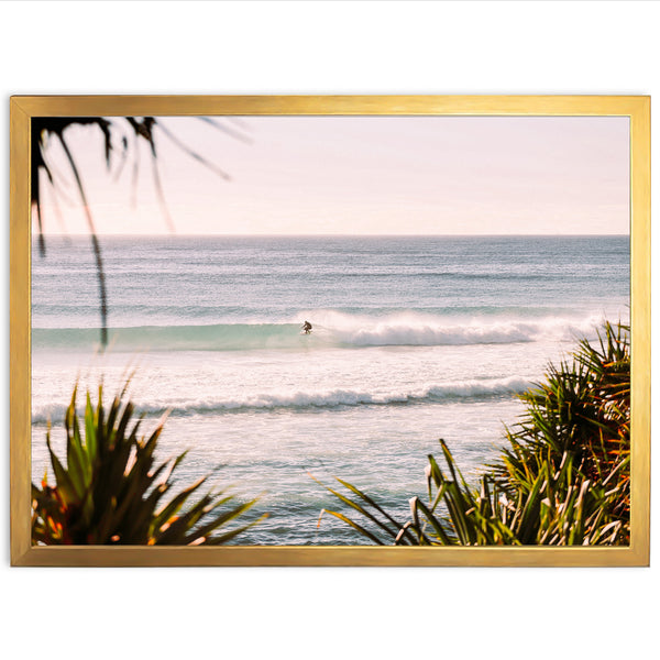 a picture of a surfer riding a wave in the ocean