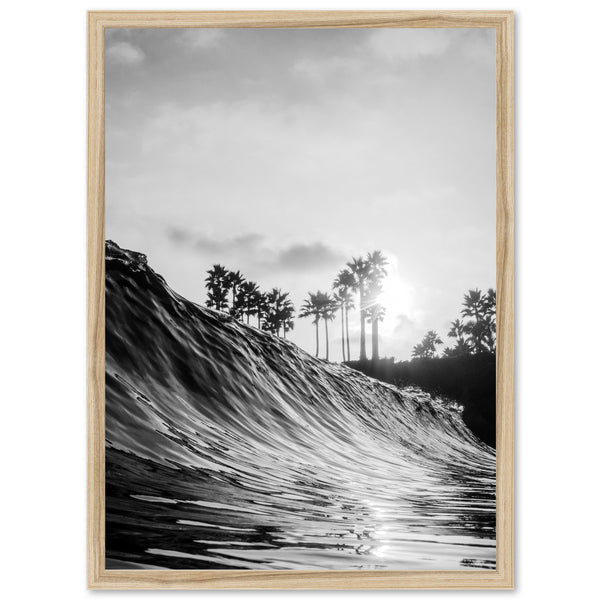 a black and white photo of a wave in the ocean