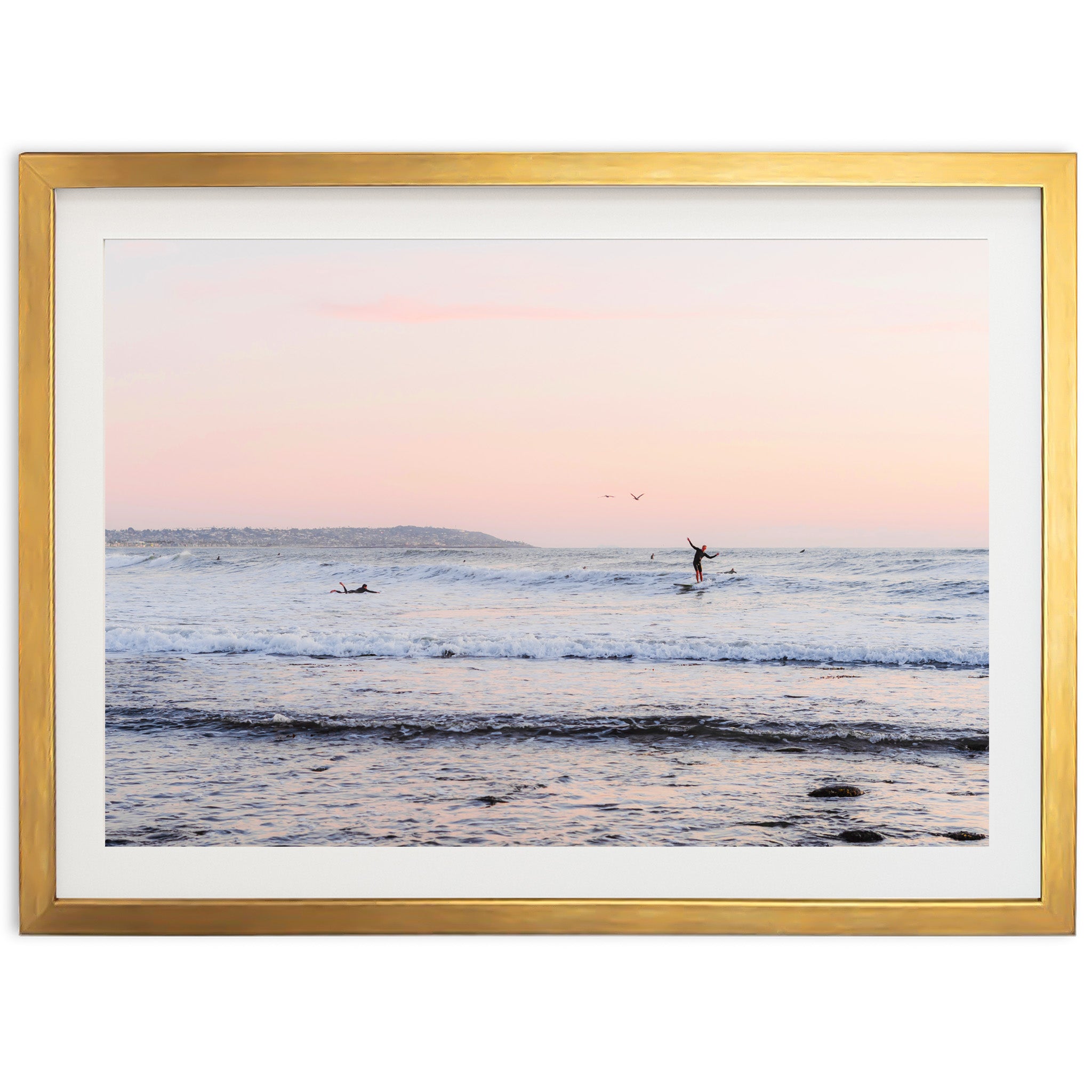 a person riding a surfboard on a wave in the ocean