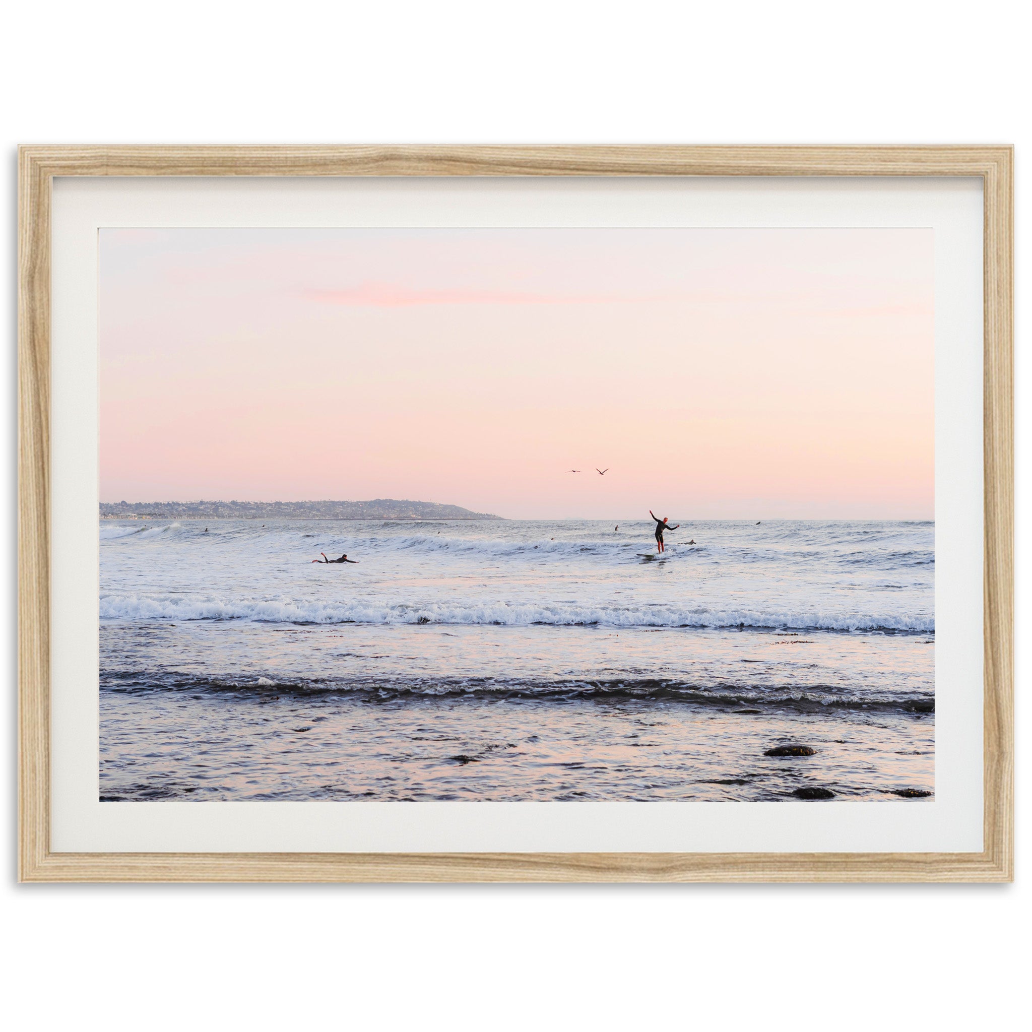 a person riding a surfboard on a wave in the ocean