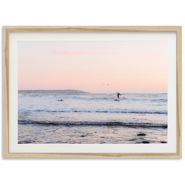 a person riding a surfboard on a wave in the ocean