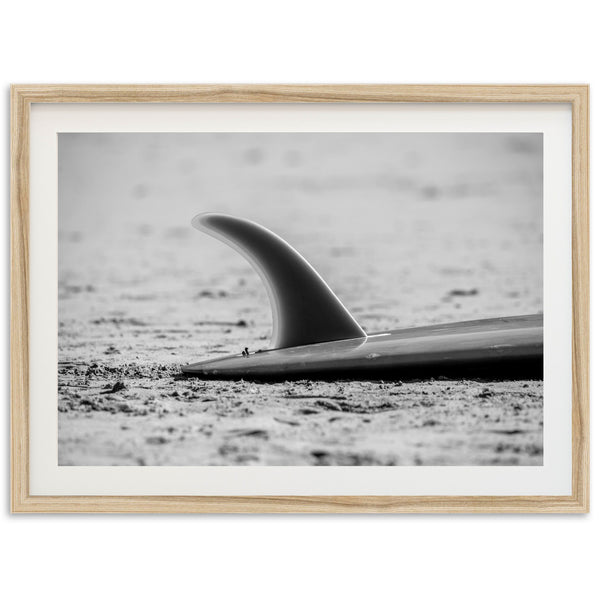 a black and white photo of a surfboard