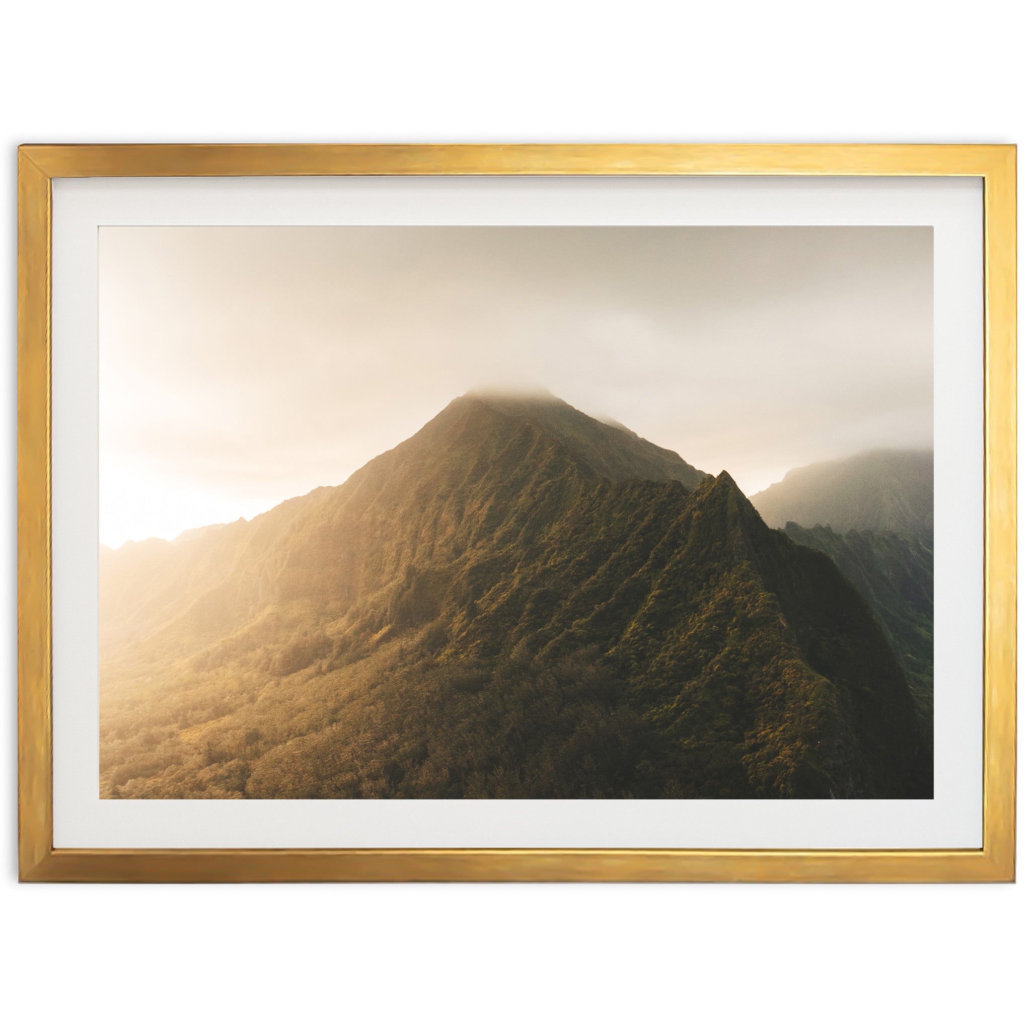 a picture of a mountain with a golden frame