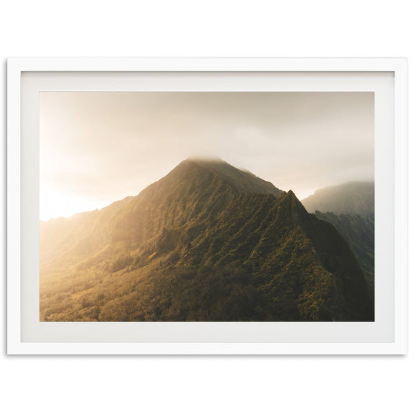 a picture of a mountain with a white frame