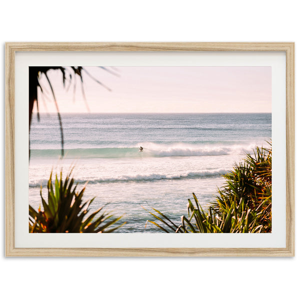 a picture of a surfer riding a wave in the ocean