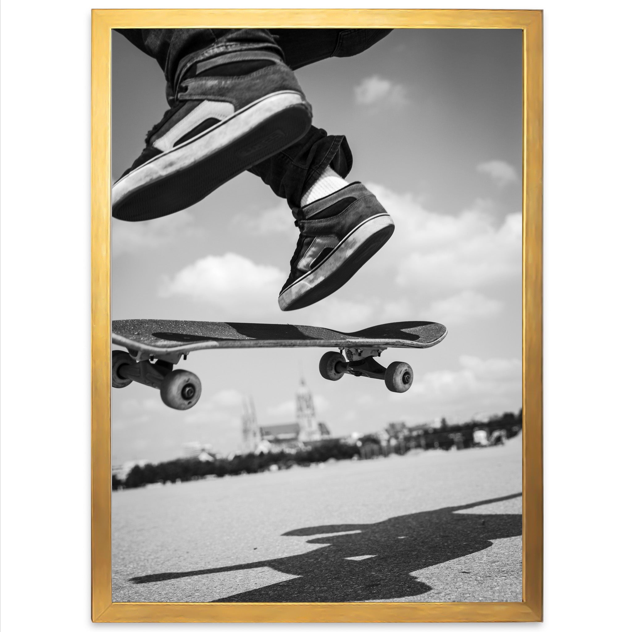 a black and white photo of a person jumping on a skateboard