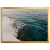 a picture of a body of water with a gold frame