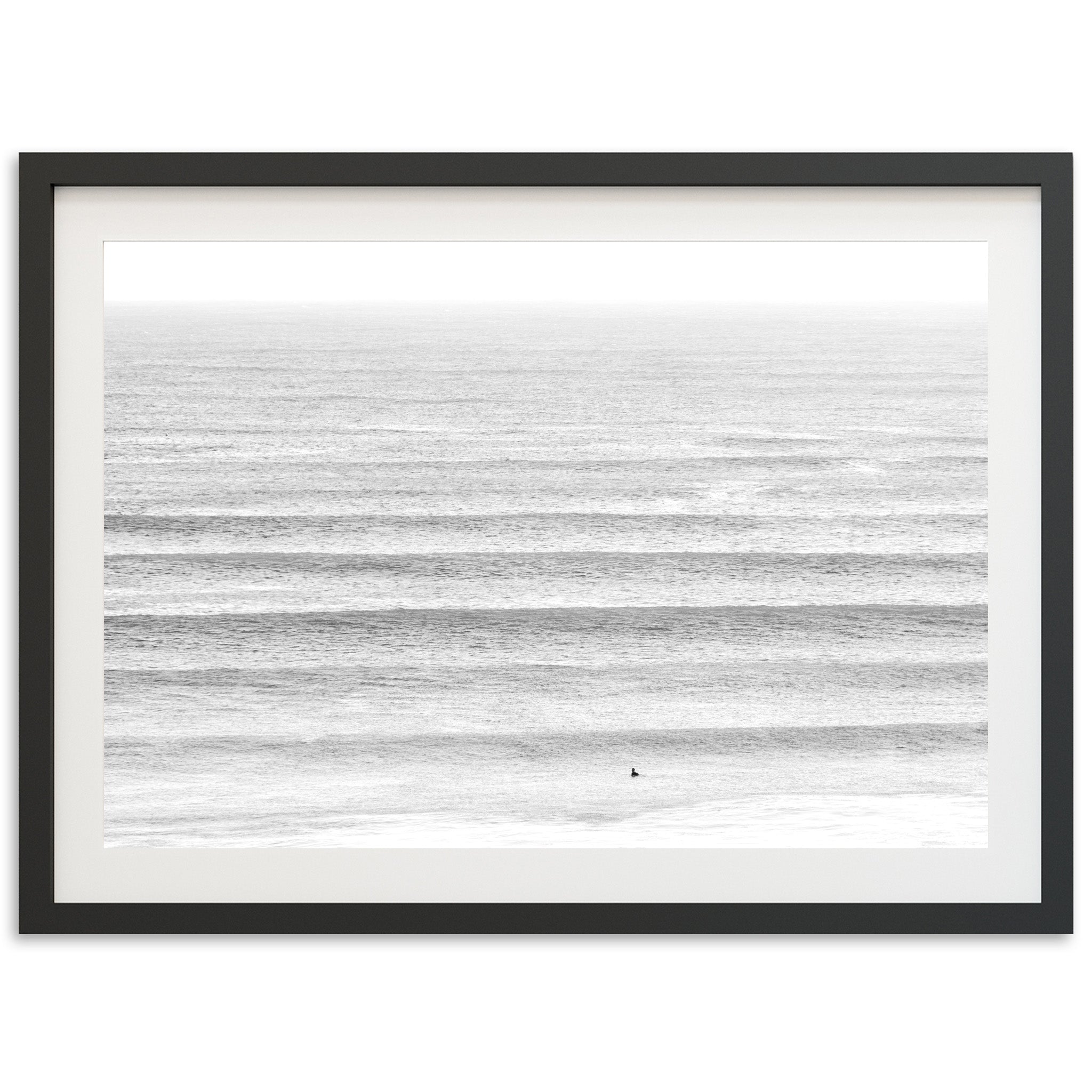 a black and white photo of the ocean