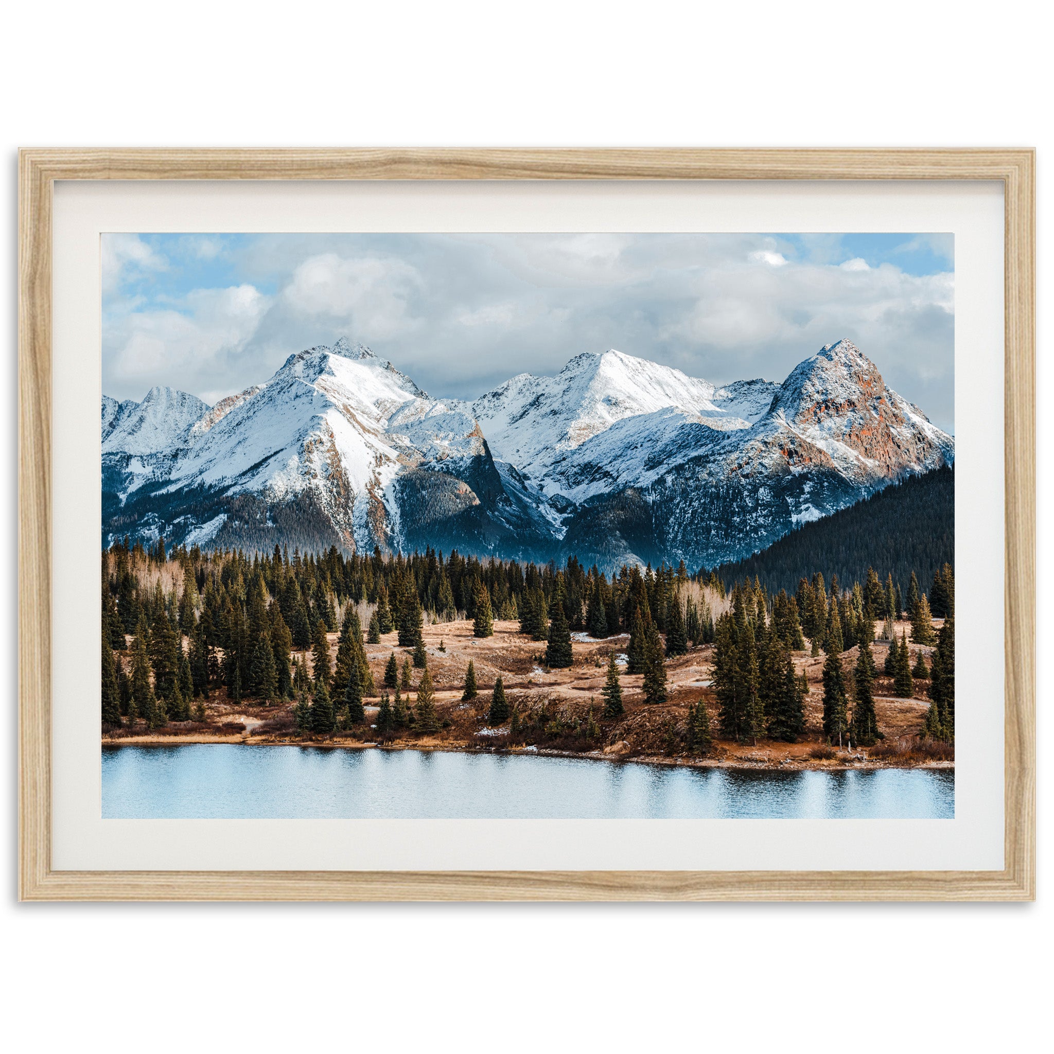 a picture of a mountain range with a lake in the foreground