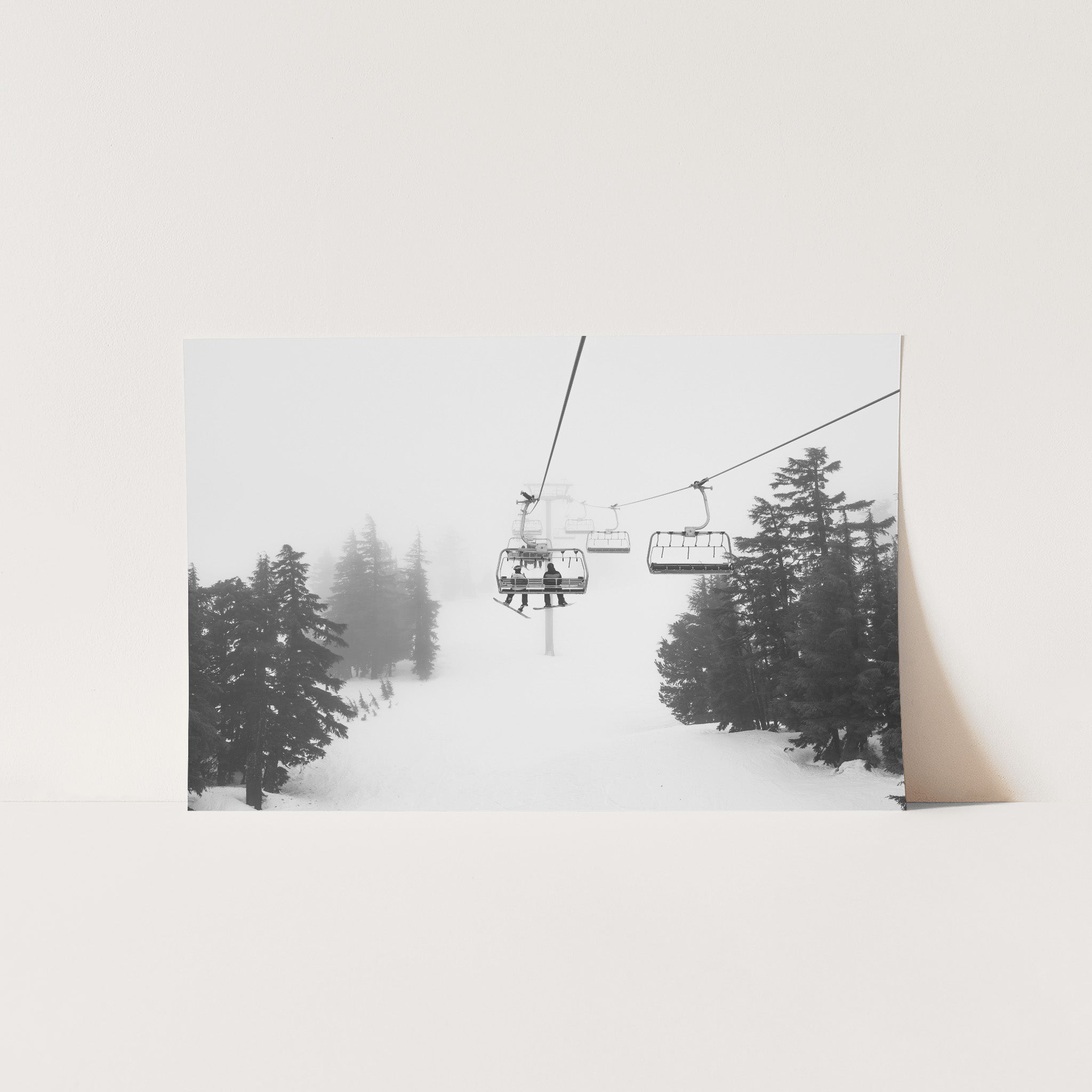 a picture of a ski lift in the snow