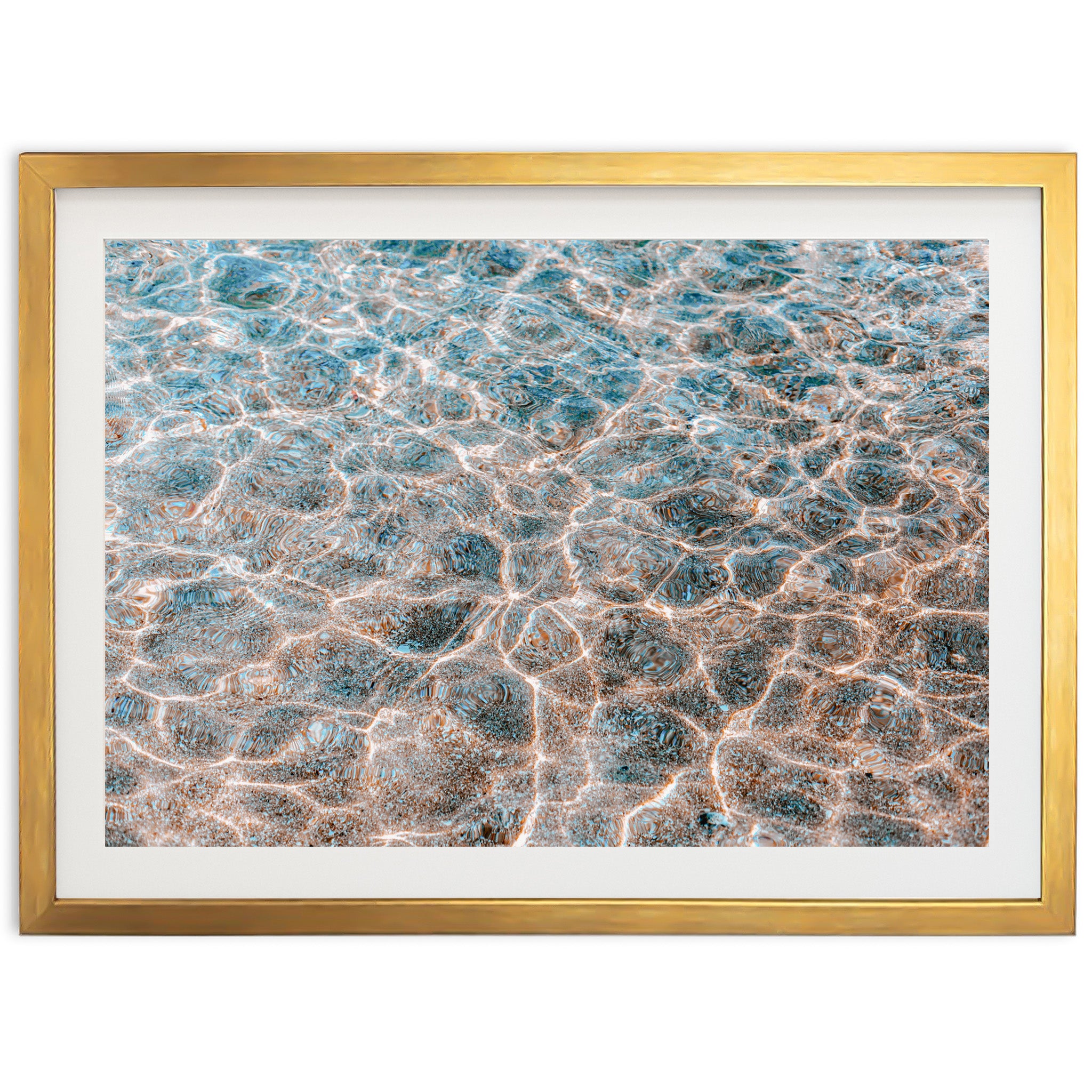 a picture of water in a gold frame