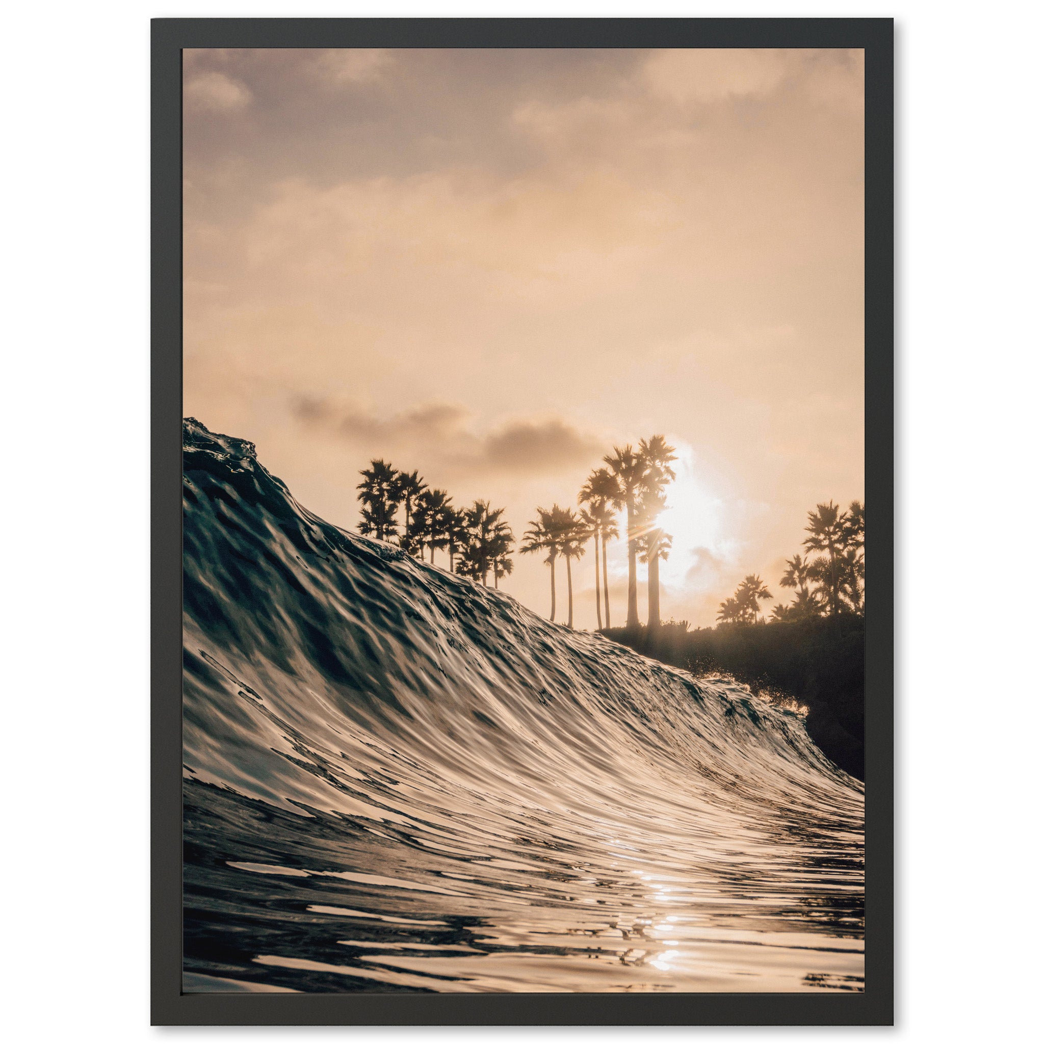 a picture of a wave in the ocean with palm trees in the background