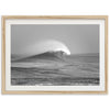 a black and white photo of a wave in the ocean