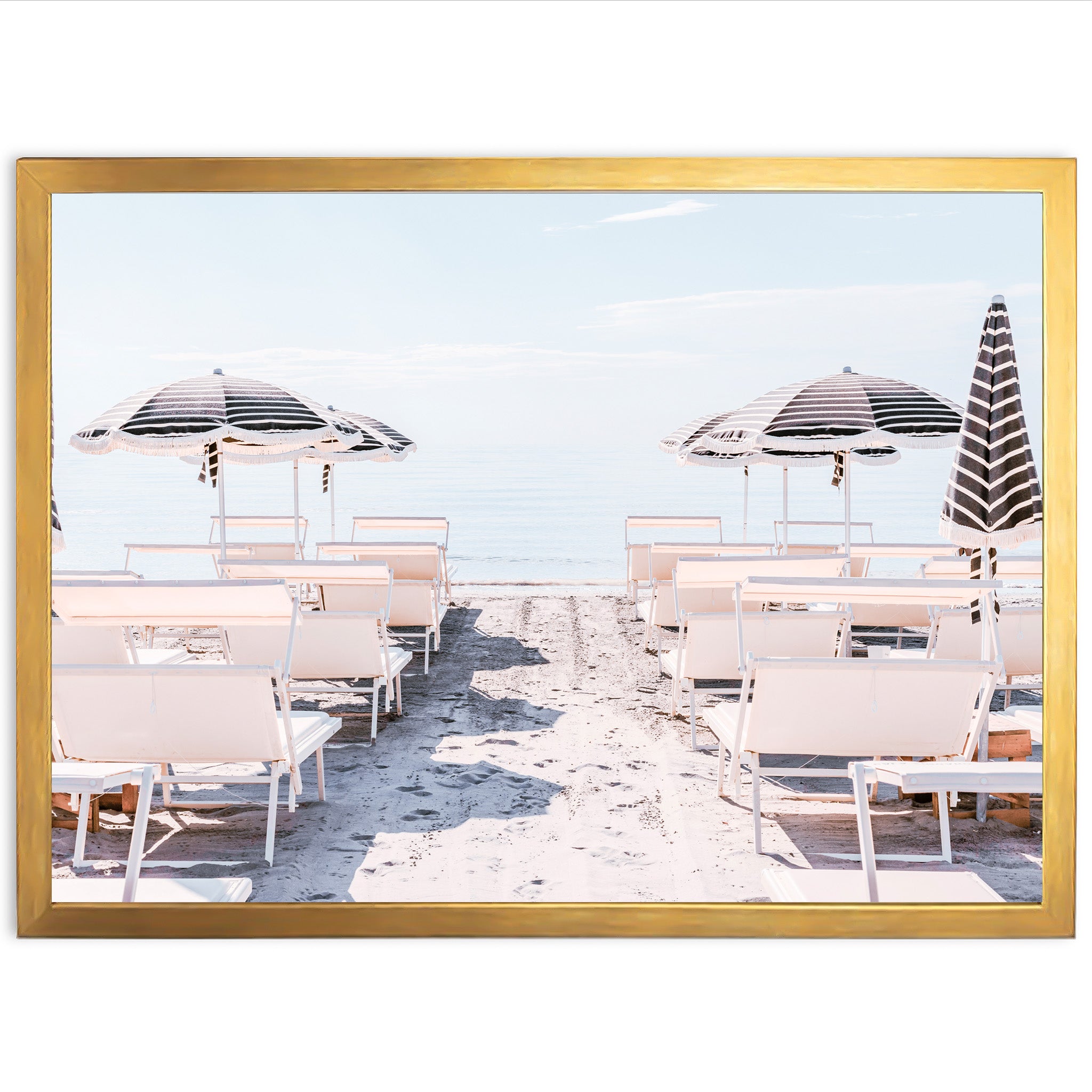 a picture of a beach with chairs and umbrellas