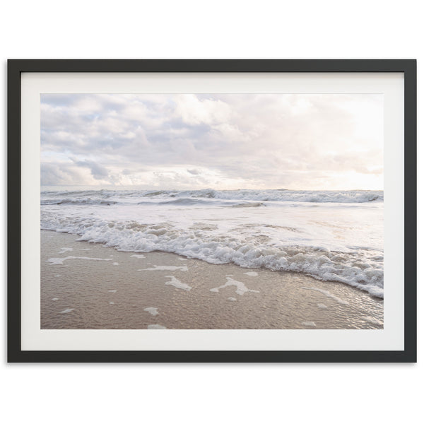 a picture of a beach with waves coming in