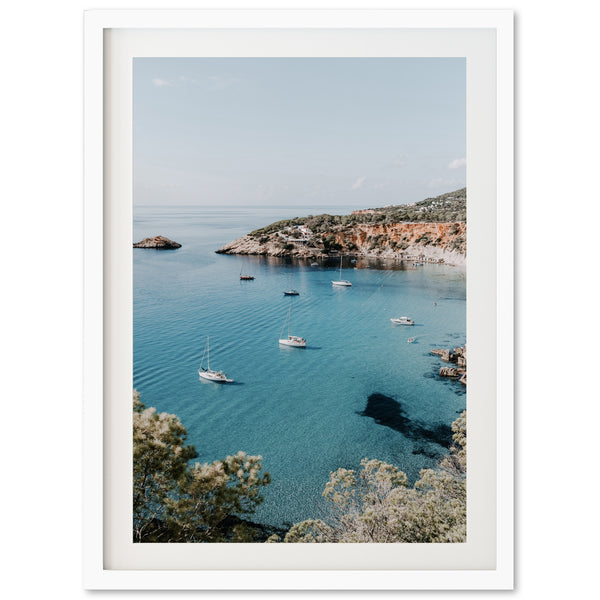 a picture of boats floating in a body of water