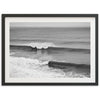 a black and white photo of a wave in the ocean