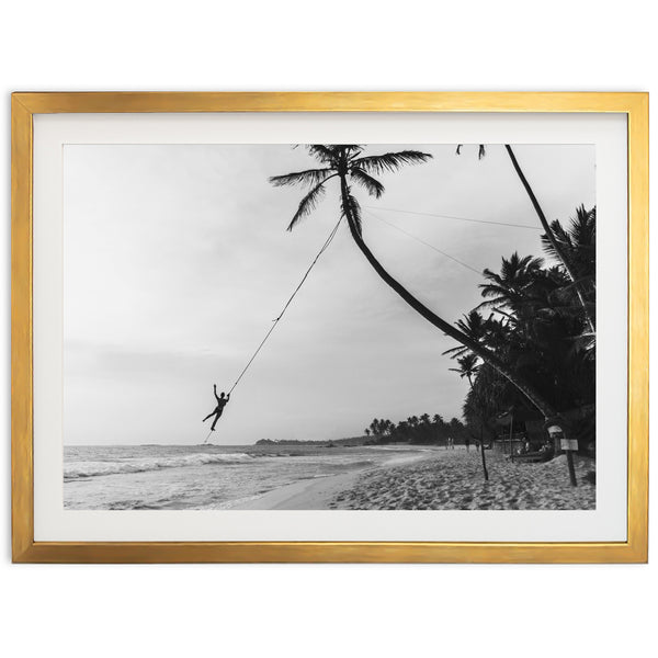 a black and white photo of a person on a rope