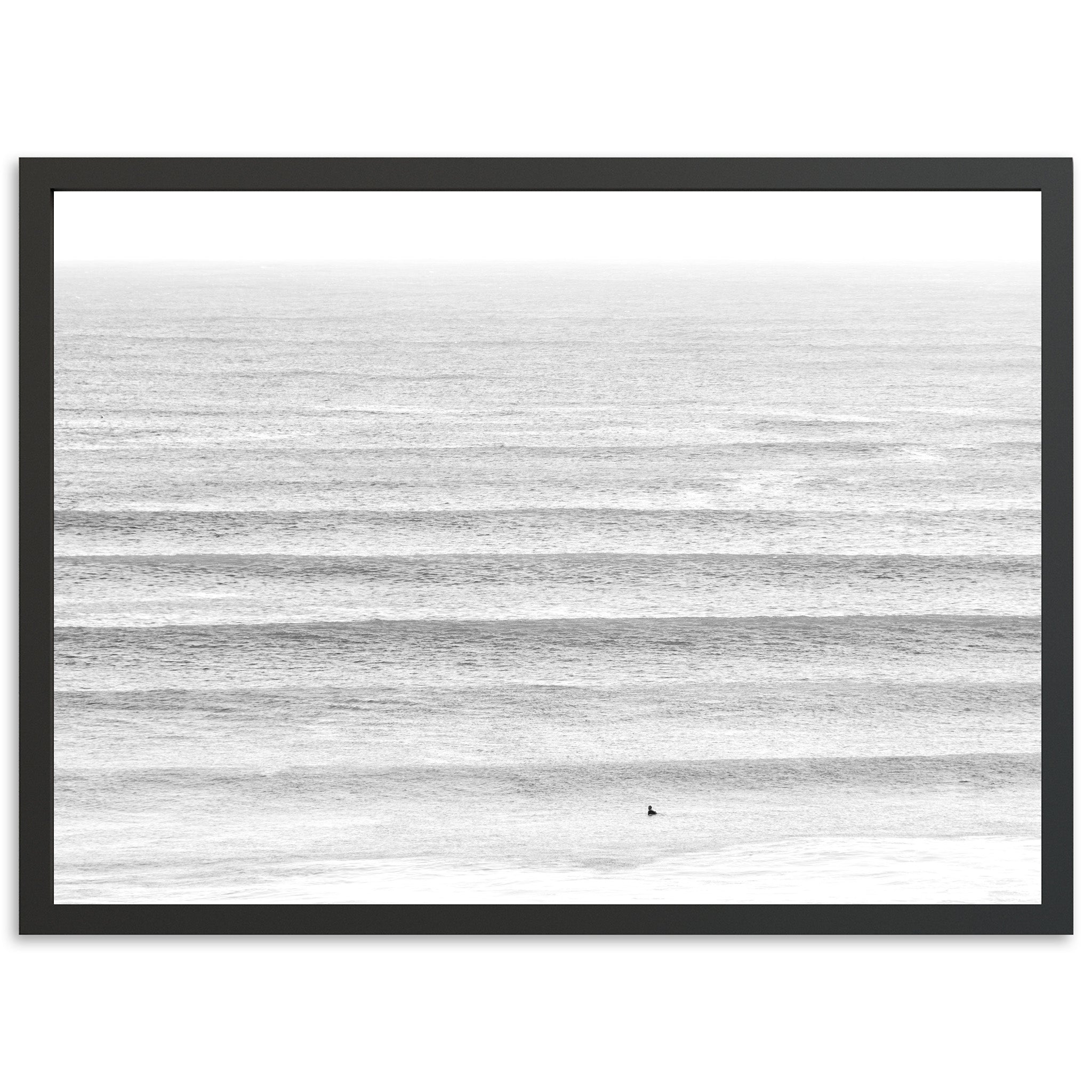 a black and white photo of the ocean