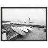 a black and white photo of two surfboards