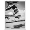 a black and white photo of a person jumping on a skateboard