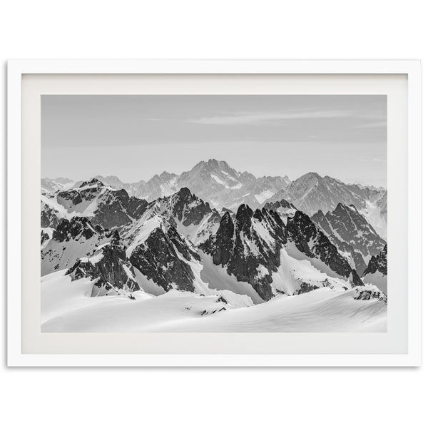 a black and white photo of a mountain range