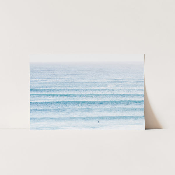 a piece of paper with a picture of the ocean