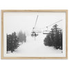 a black and white photo of a ski lift