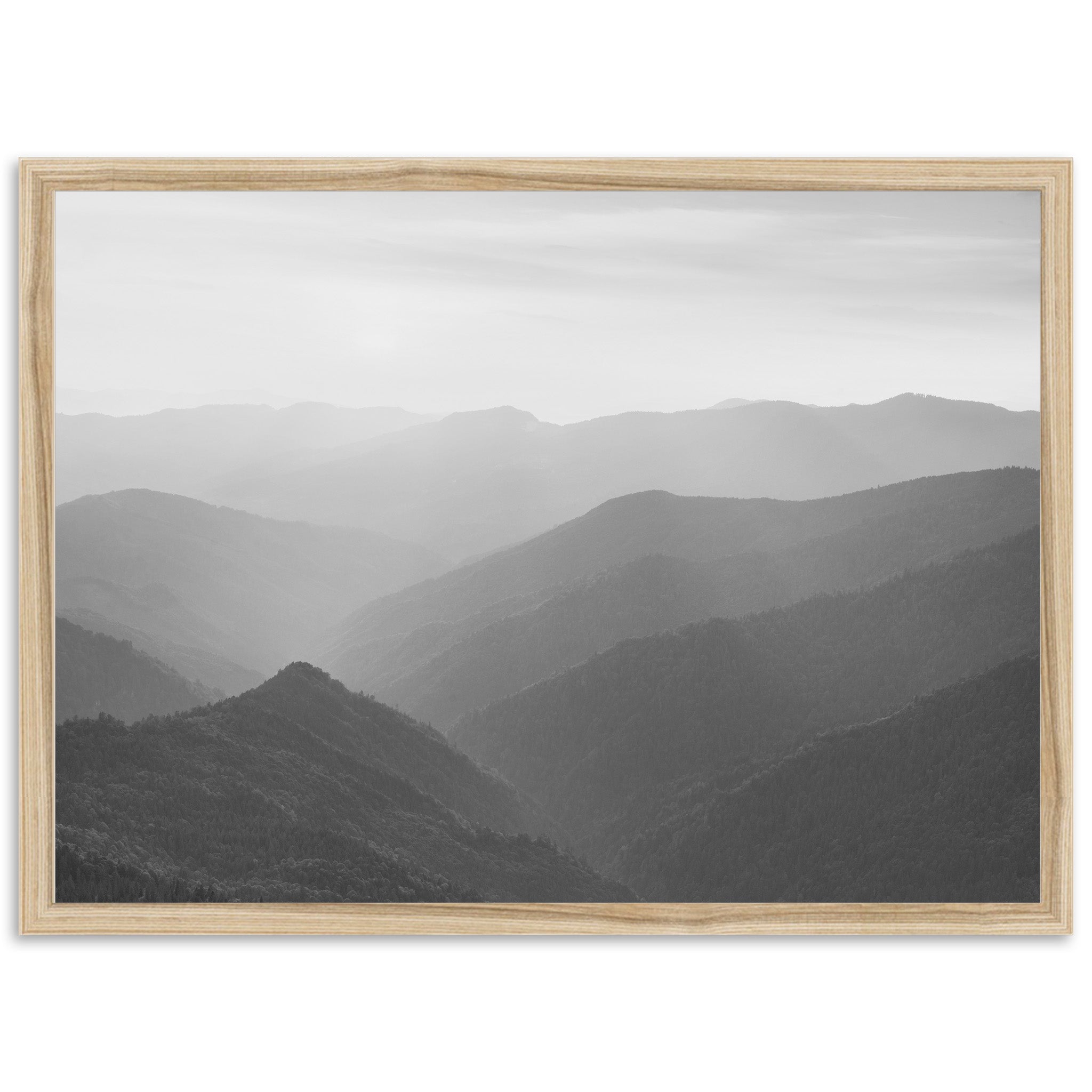 a black and white photo of a mountain range