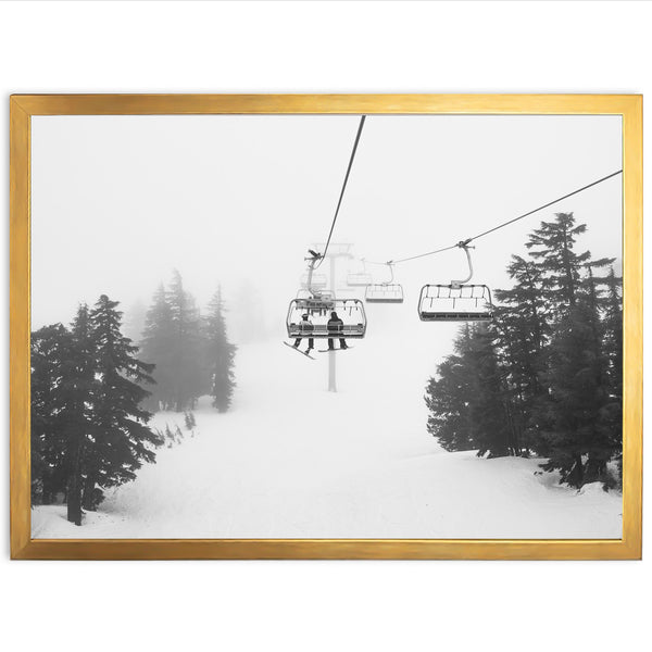 a black and white photo of a ski lift