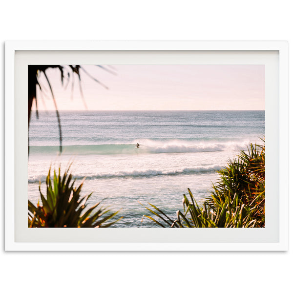 a picture of a surfer riding a wave in the ocean