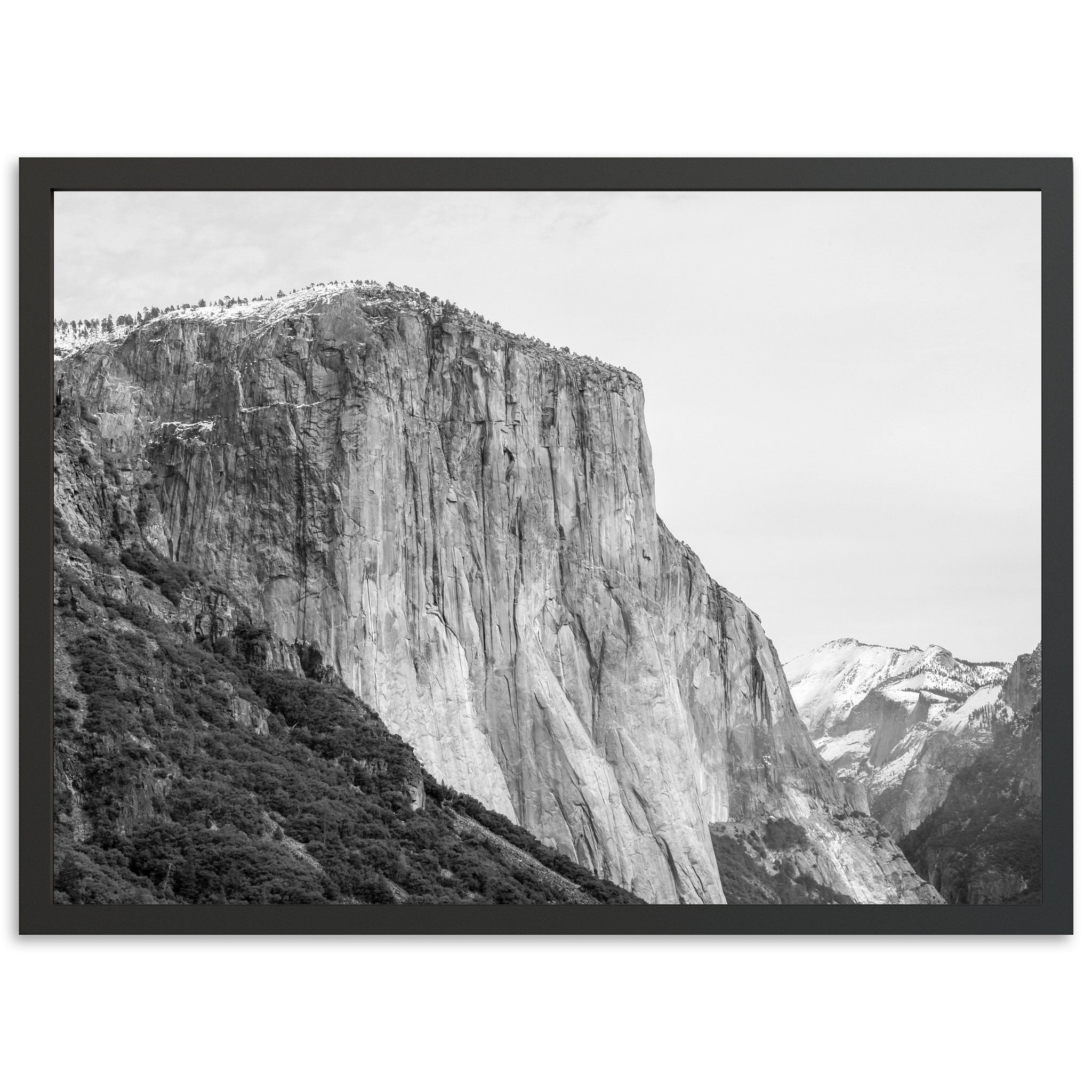 a black and white photo of a mountain