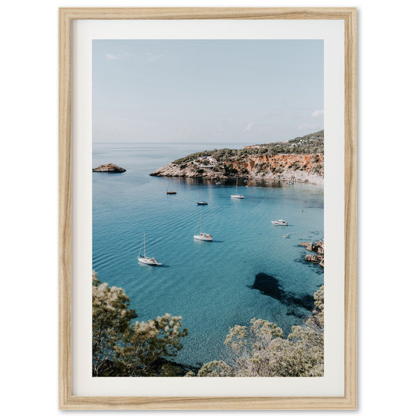 a picture of boats floating in a body of water