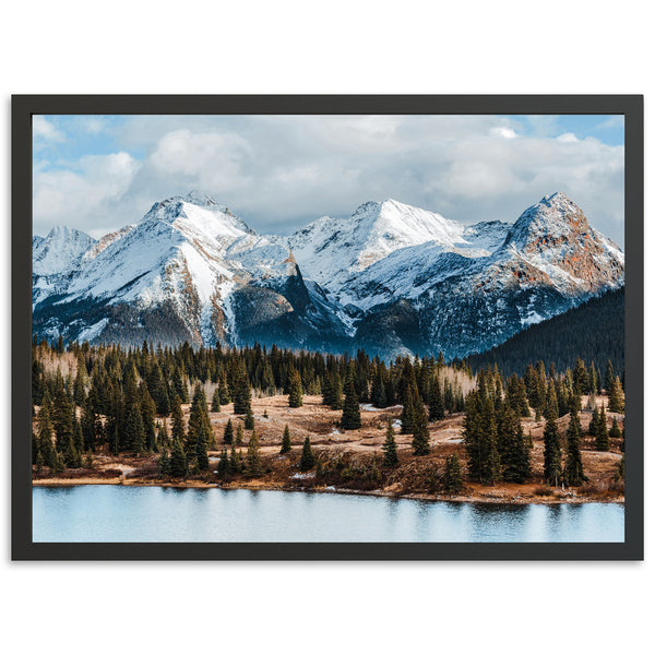 a picture of a mountain range with a lake in the foreground