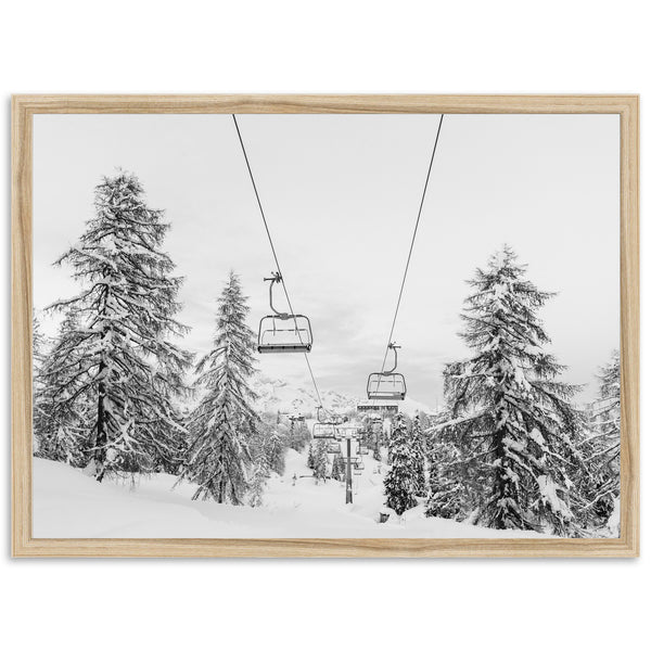 a black and white photo of a ski lift