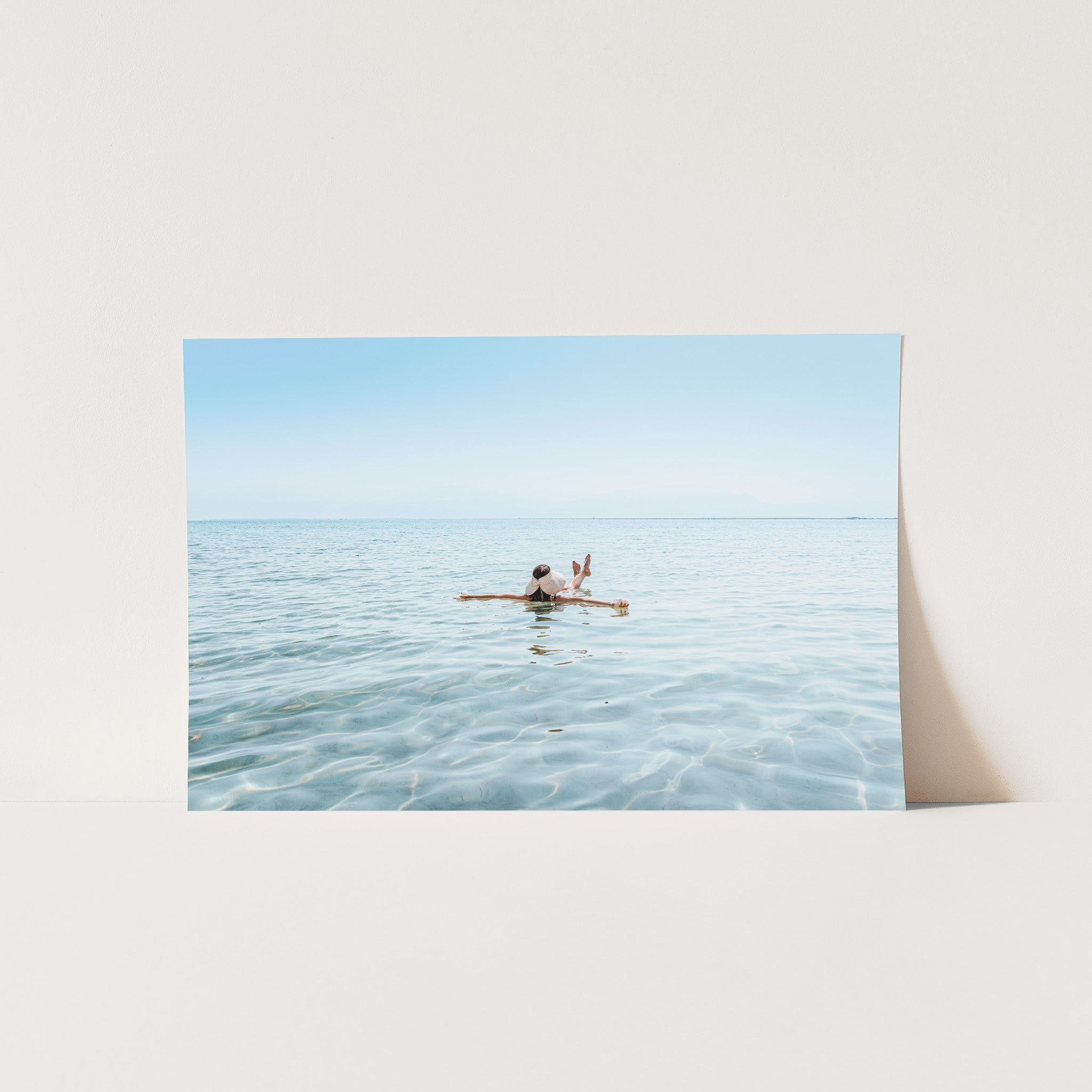 a photo of a person in a kayak in the ocean