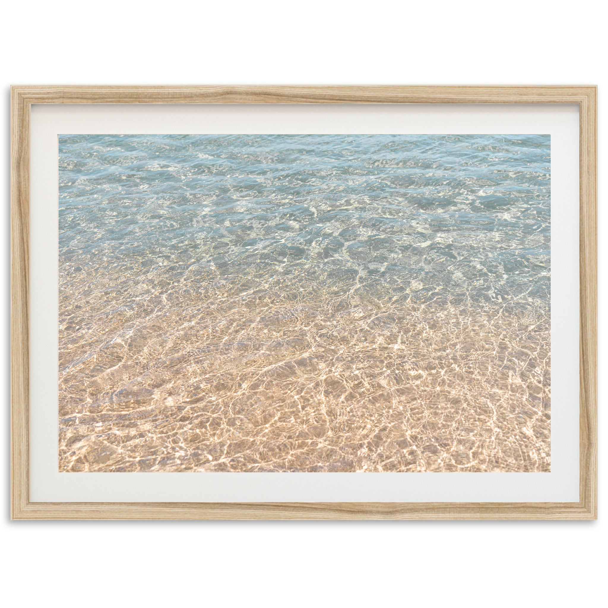 a picture of a beach with water and sand