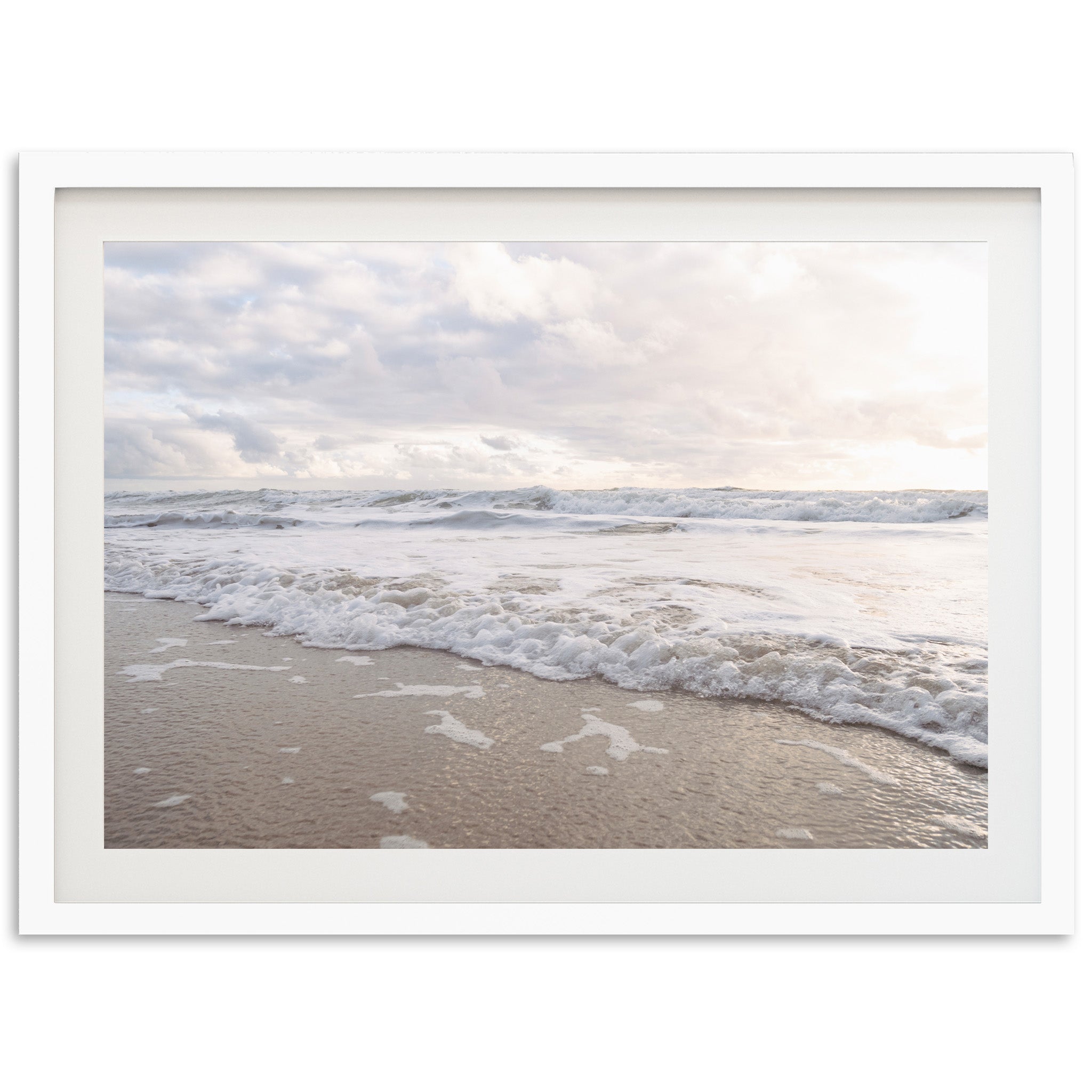 a picture of a beach with waves coming in