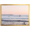 a person riding a surfboard on a wave in the ocean