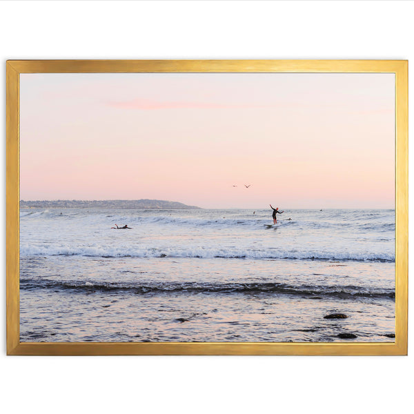 a person riding a surfboard on a wave in the ocean