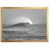 a black and white photo of a wave in the ocean