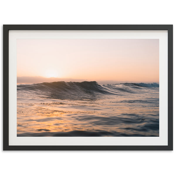 a picture of a sunset over the ocean