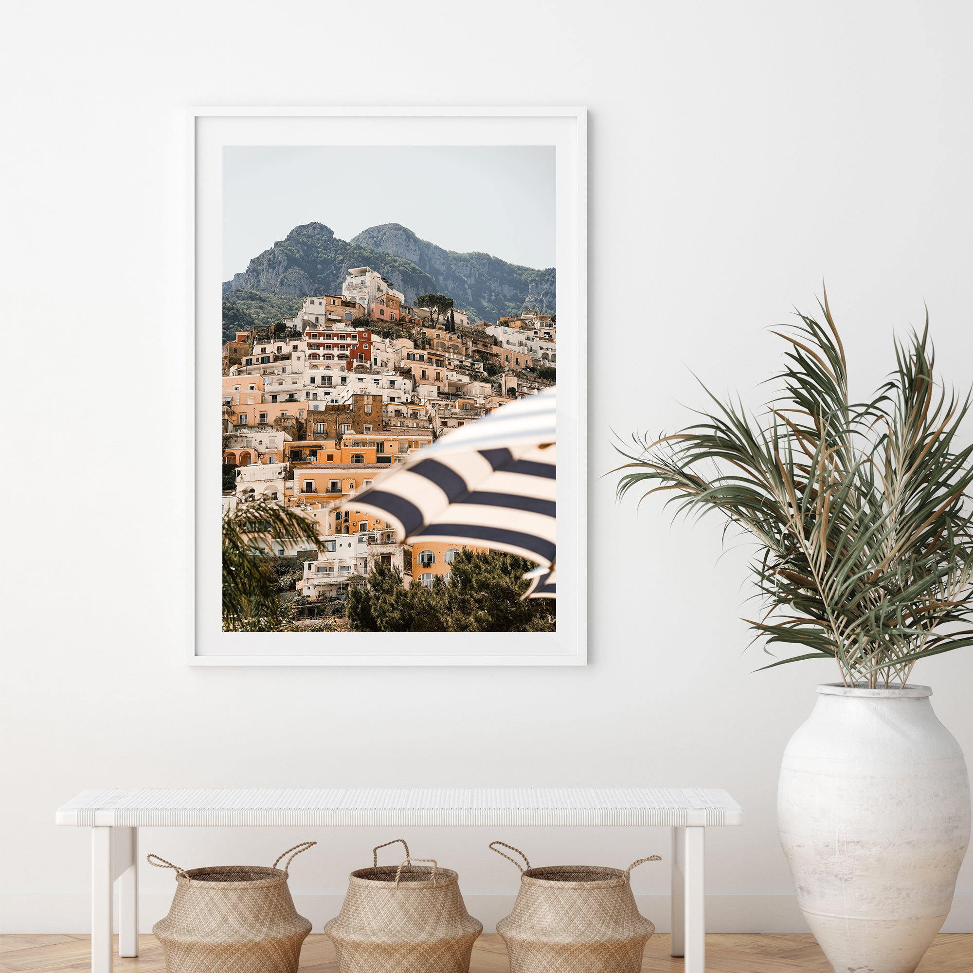 a picture of a city with mountains in the background