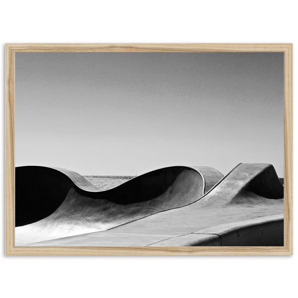 a black and white photo of a skate park